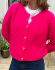GILET BOUTON-FUSHIA FLUO